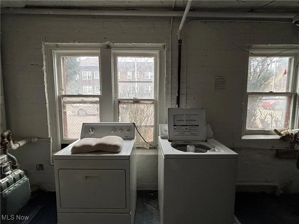 Laundry room featuring washing machine and dryer