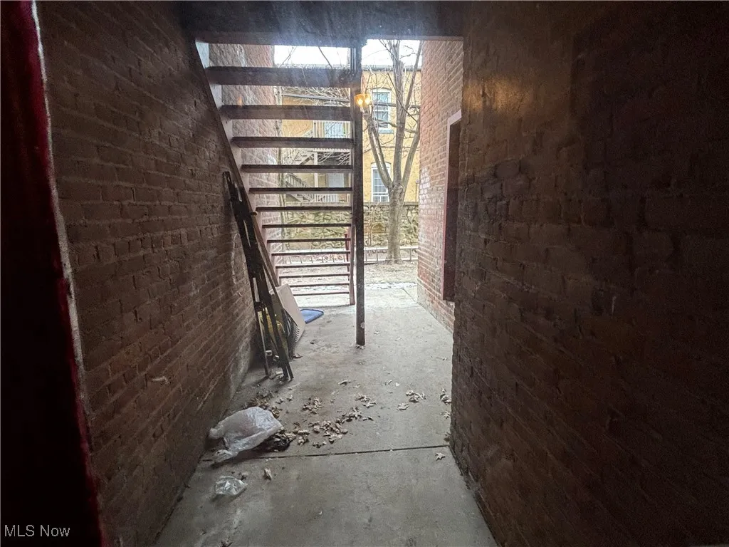 Basement with brick wall