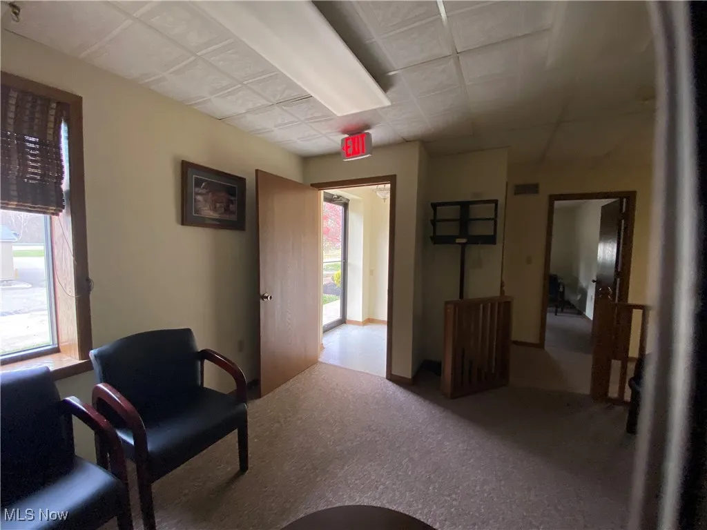 Office and or waiting area with entrance.