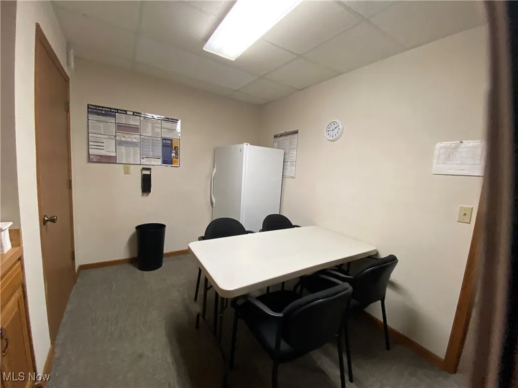 Breakroom with sink and storage.