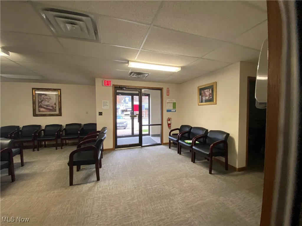 Office waiting area with entry.