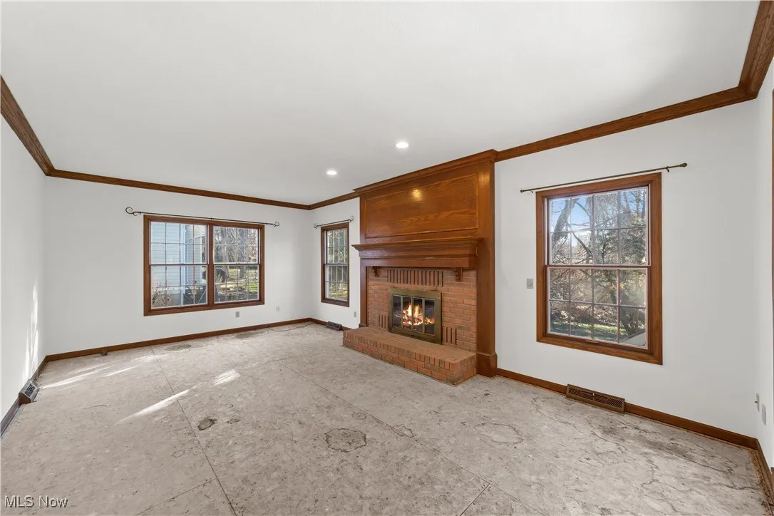 Family Room with fireplace and wood mouldings