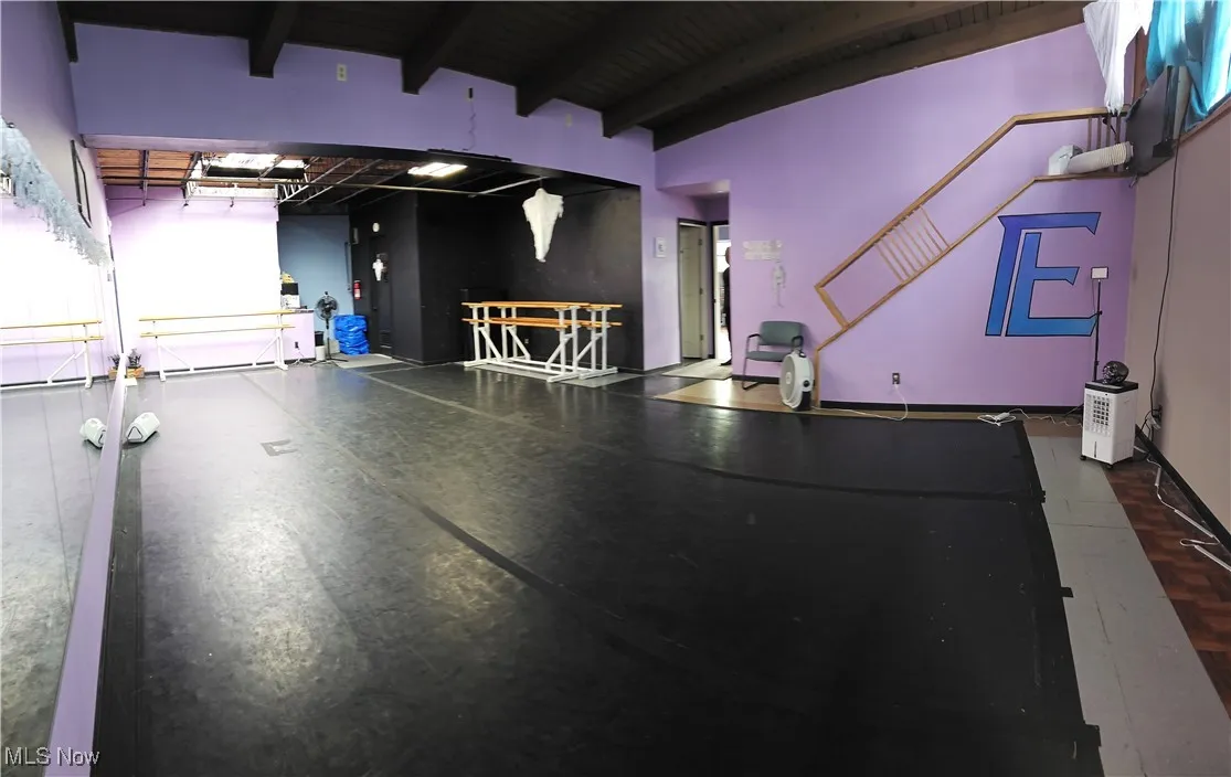 Garage featuring wood ceiling