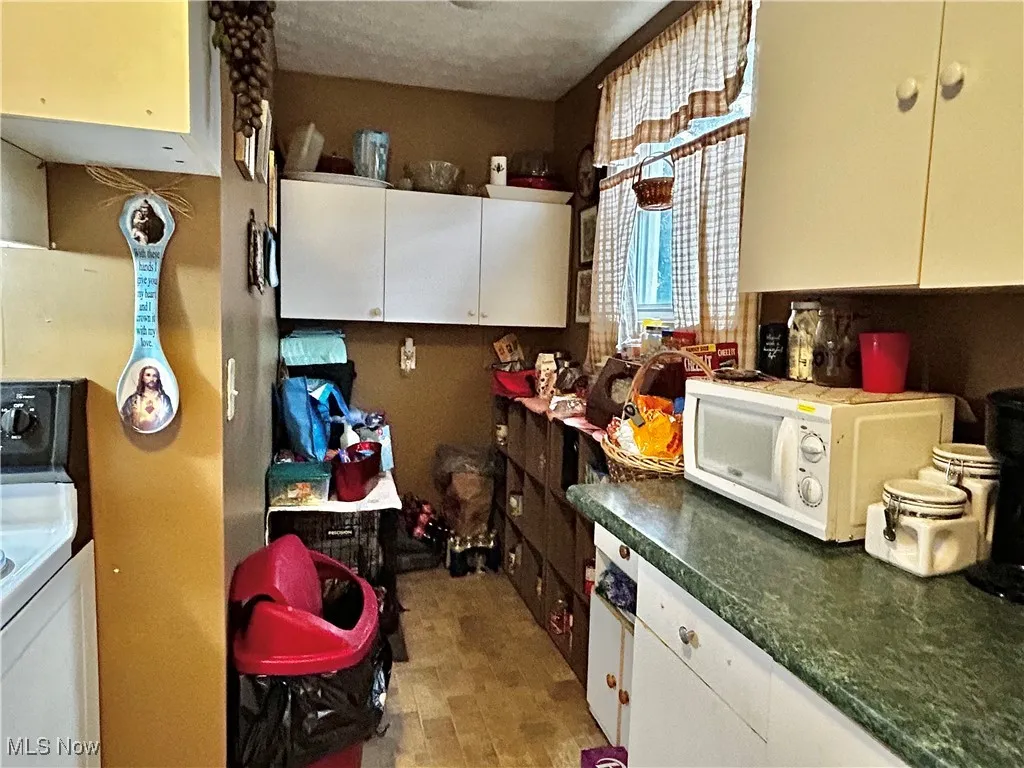 Kitchen with white cabinets
