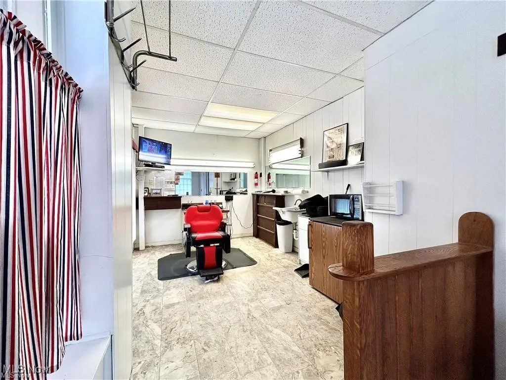 Office area featuring a paneled ceiling