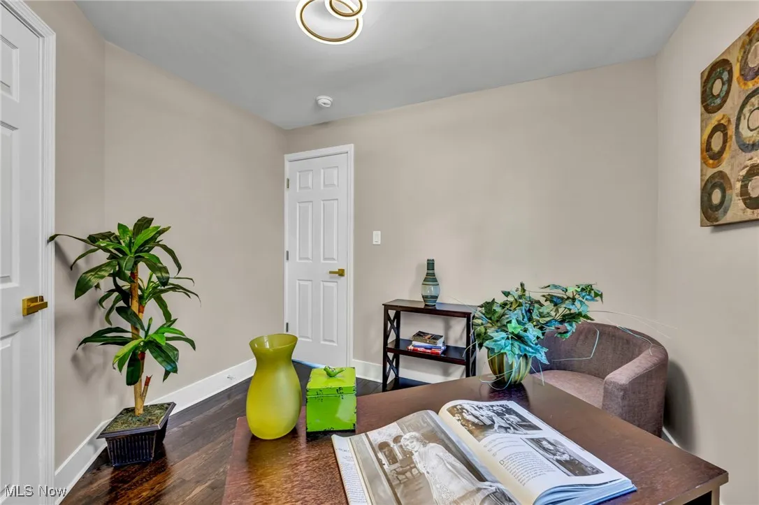 Dining room with baseboards and wood finished floors