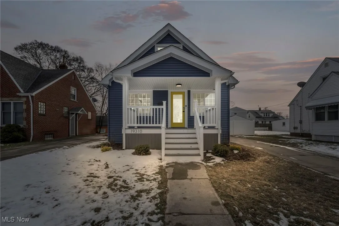Bungalow featuring a porch