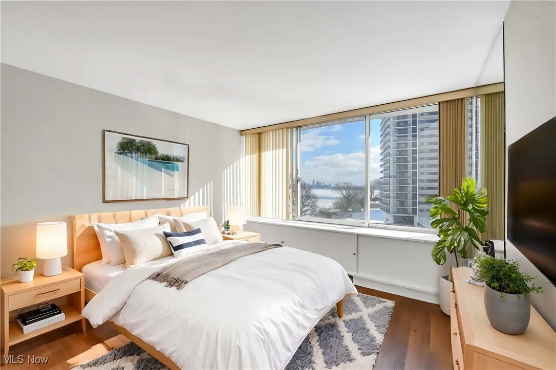Bedroom featuring dark hardwood / wood-style flooring