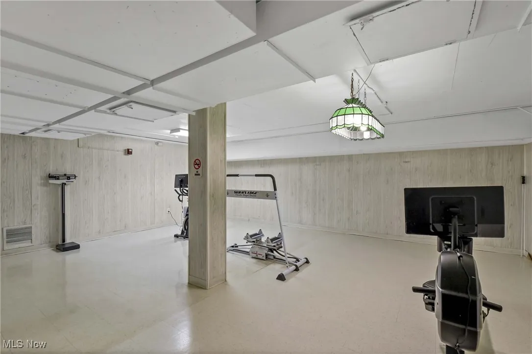 Workout area with wood walls