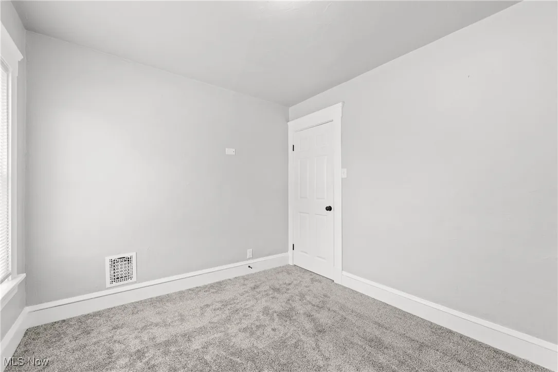 Unfurnished room featuring carpet floors