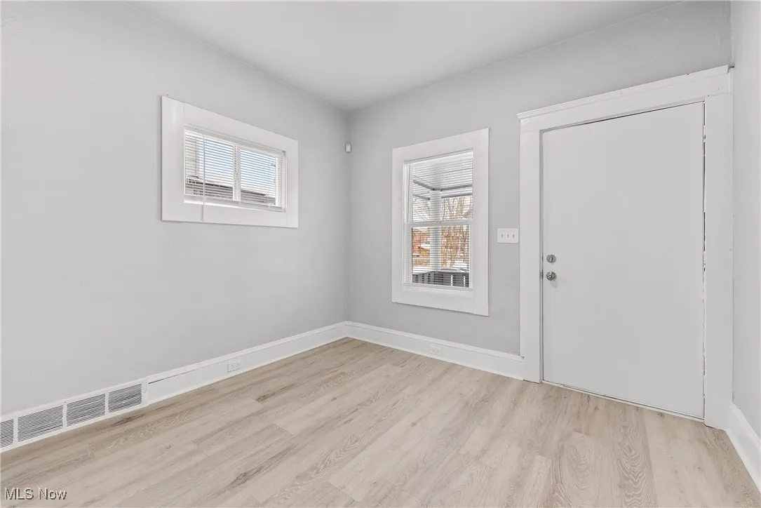 Spare room featuring light hardwood / wood-style floors