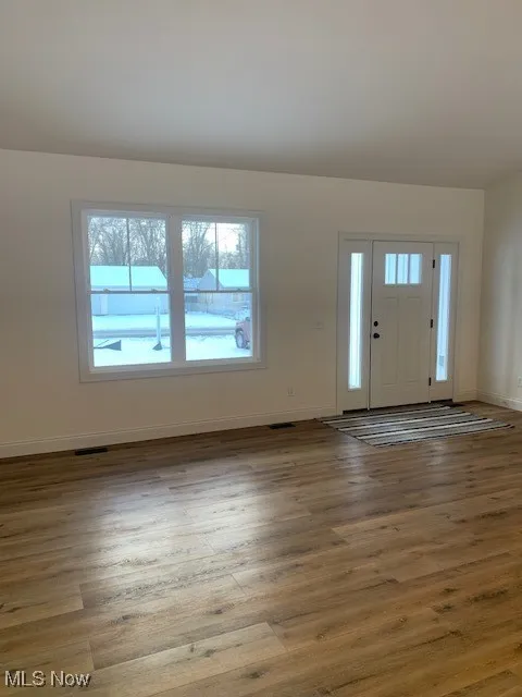 family room with vaulted ceiling