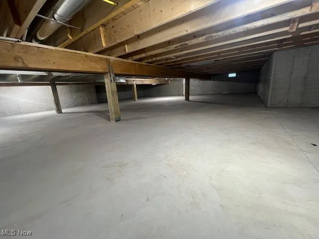 Crawl Space with nice depth, interior & exterior drain tile, sump pump with back-up and LED lighting