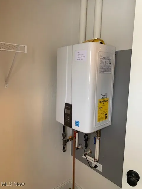 on demand water heater located in the laundry room closet