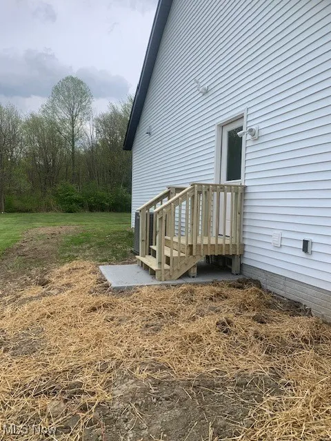 Side door to and from the laundry room
