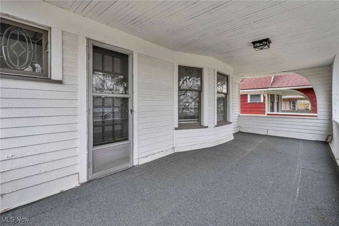 Entrance to property with a porch