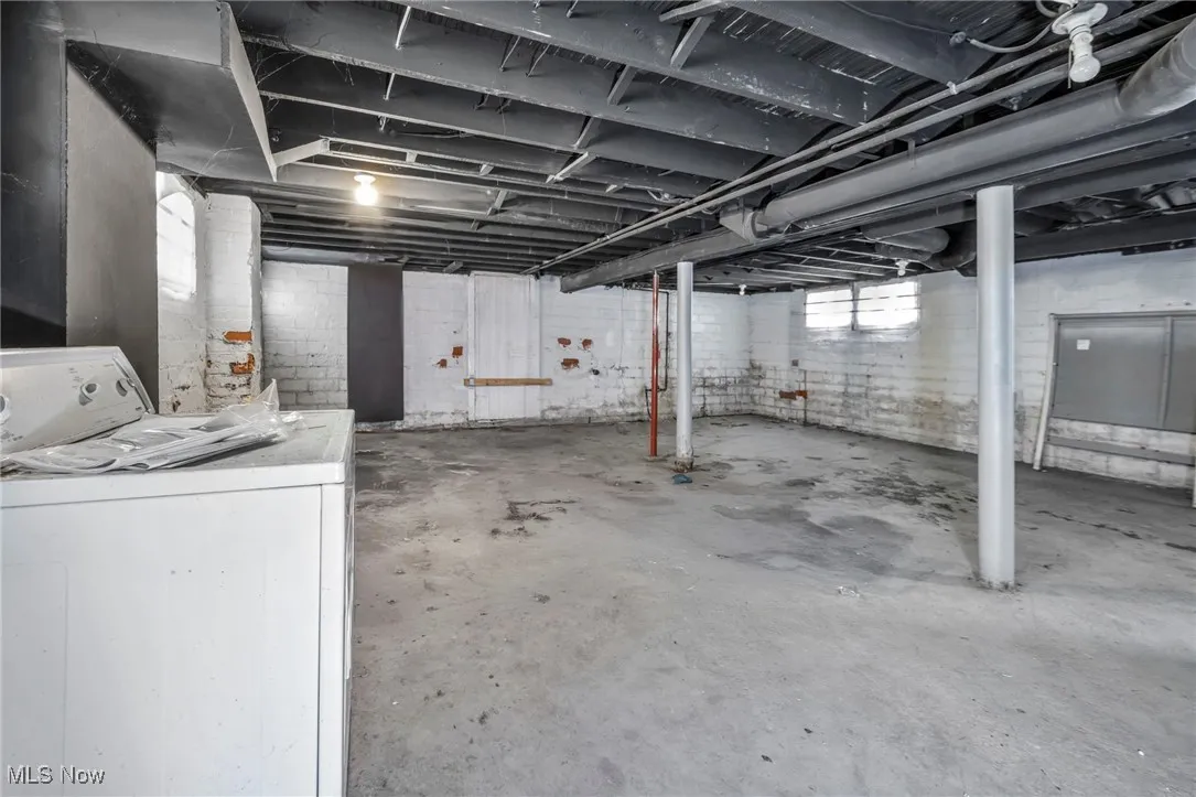 Basement featuring washer / clothes dryer