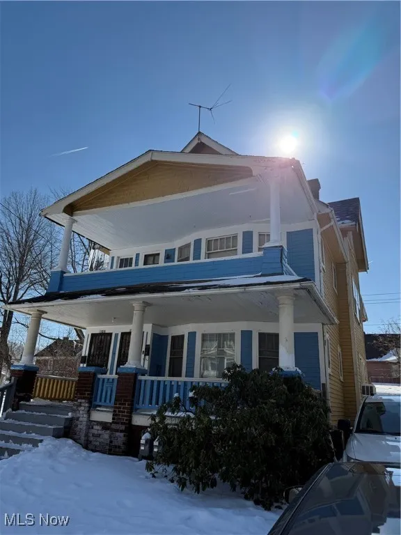 View of front of property featuring covered porch