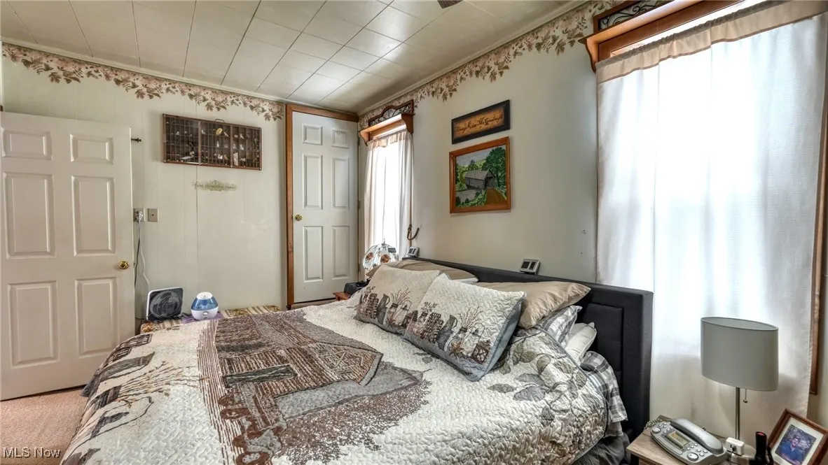 Bedroom featuring carpet