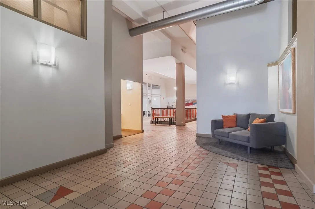 Lobby featuring a towering ceiling
