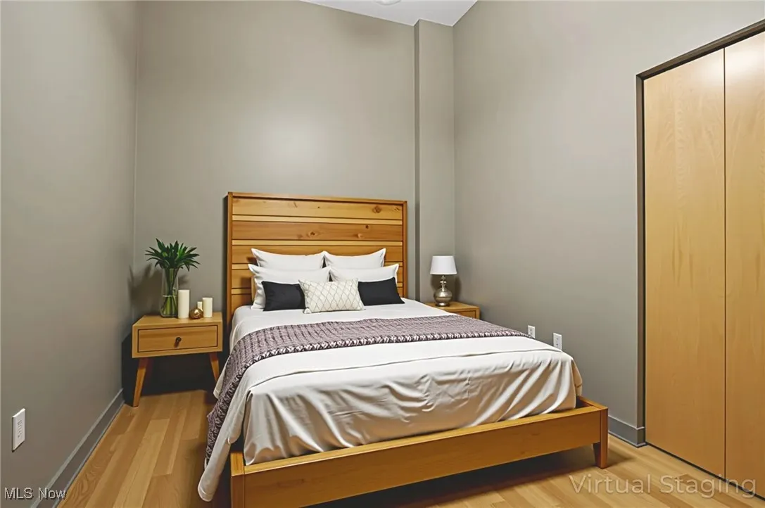 Bedroom with light wood-style floors