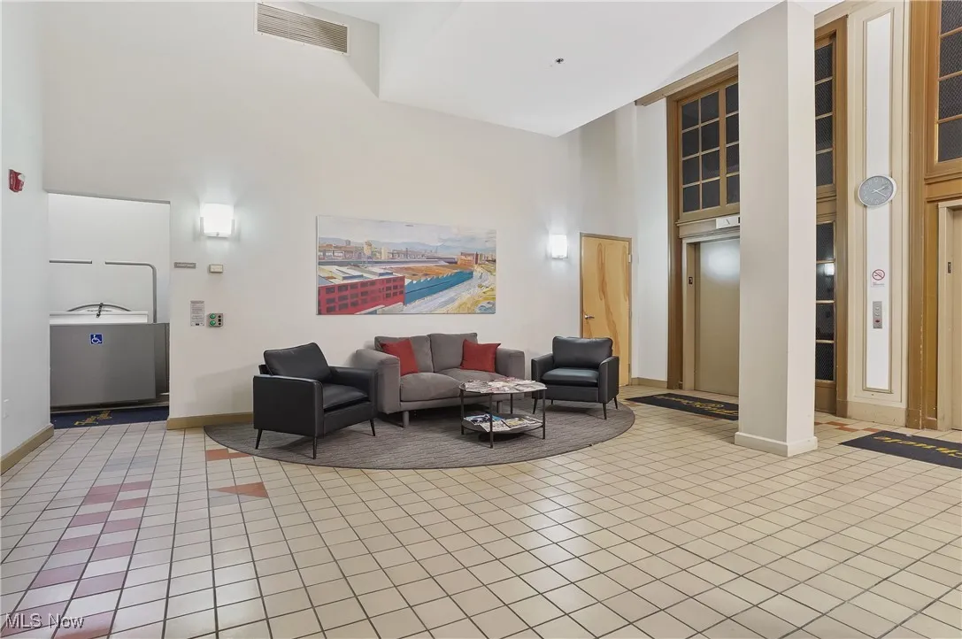 Community lobby featuring a towering ceiling