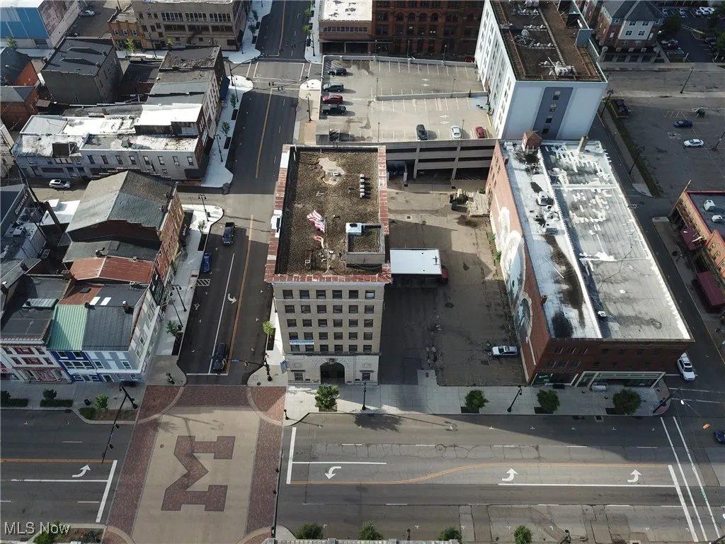 AERIAL VIEW FACING SOUTH. CANTON TO THE EAST, TUSLAW, ORRVILLE TO THE WEST.