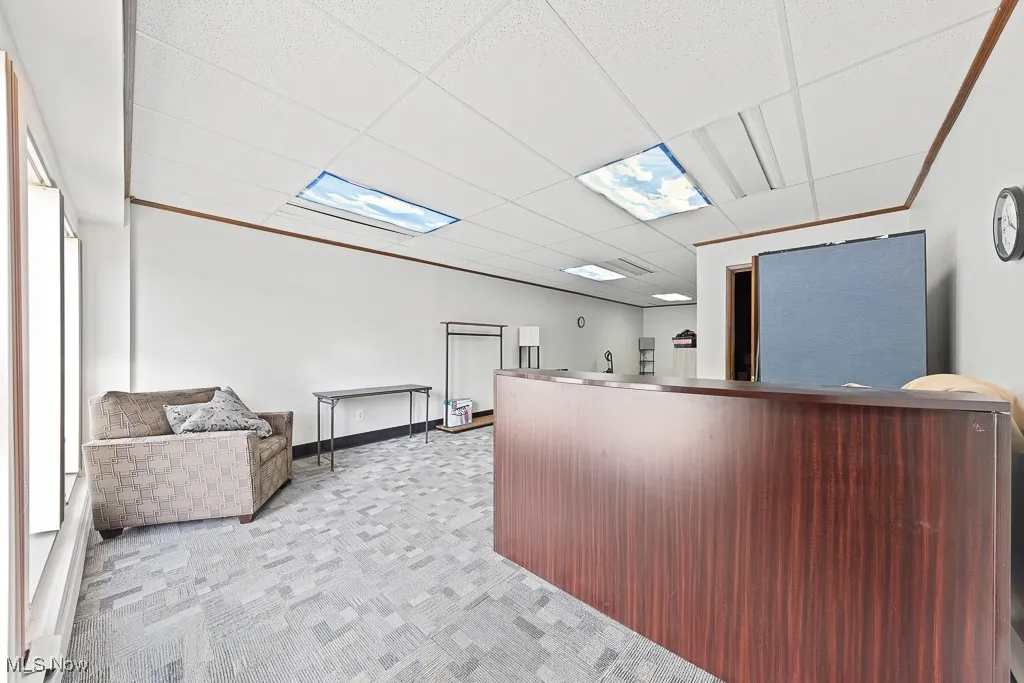 Reception with a paneled ceiling