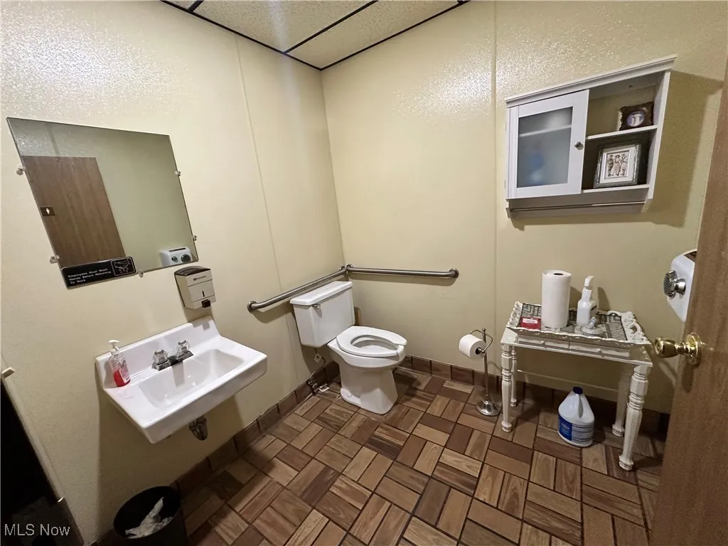 Bathroom with toilet and a sink