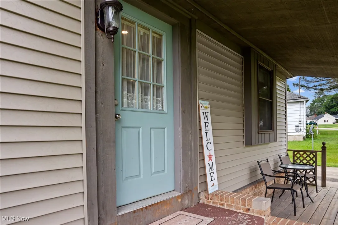 Property entrance with a porch