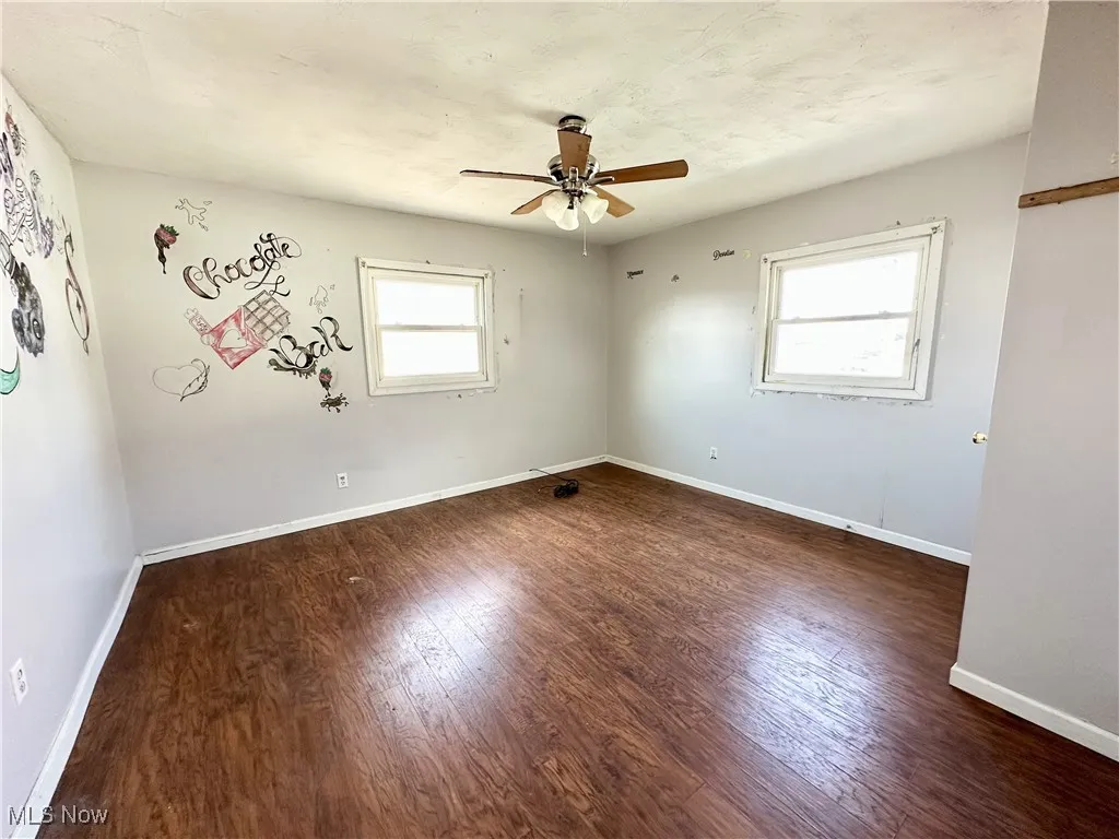 Bedroom featuring a ceiling fan
