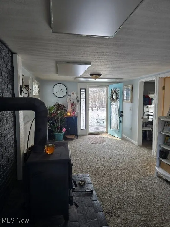 View of carpeted foyer