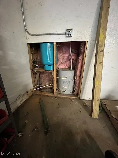 View of well pump and hot water heater
