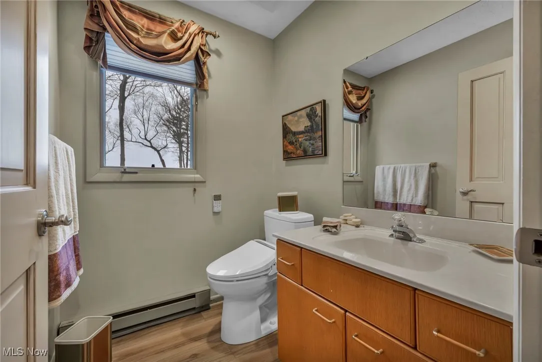 Half bath in mudroom garage area.