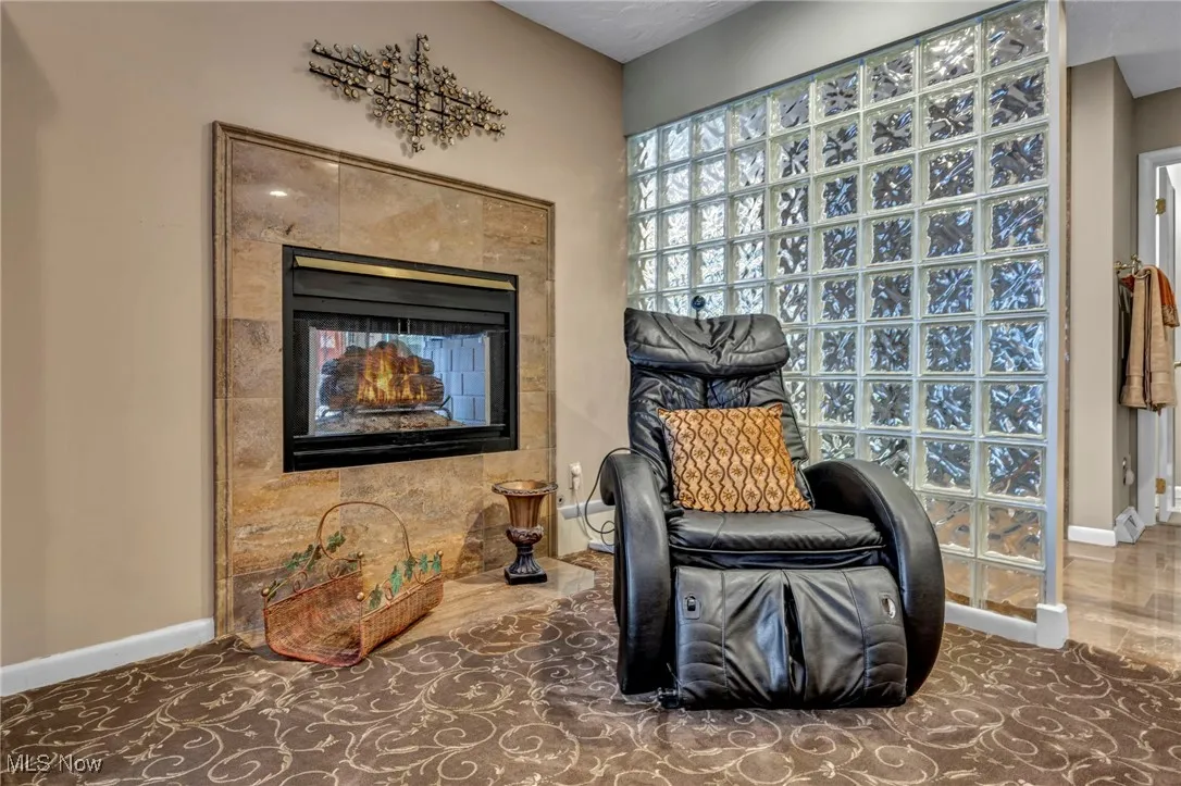Master bedroom, fireplace sitting area.