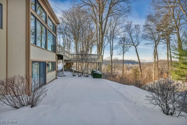 Large patio below and to the side of the deck and outside of the lower level family room.