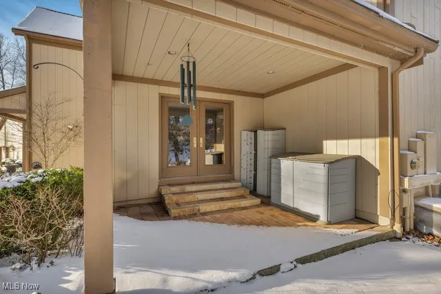 This is the covered patio on the front right side of the house with French door entrance to the Office/Living room.