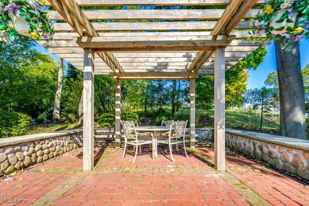 This is part of the front yard garden area. There is also various patios, waterfall and pond.