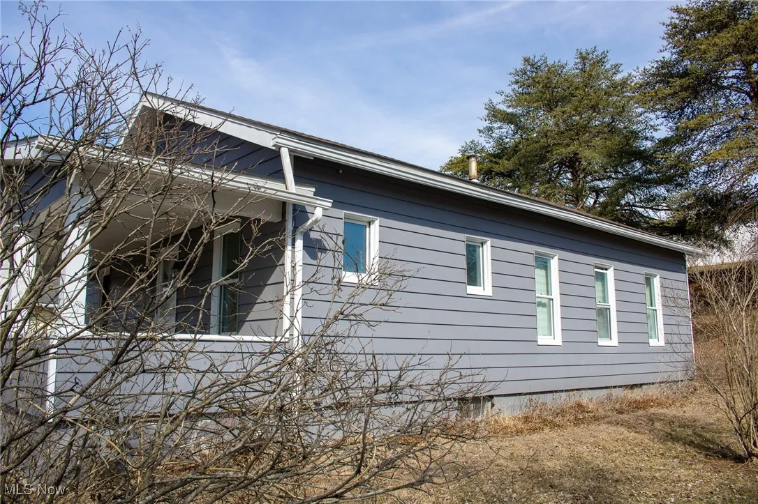 View of home's exterior featuring crawl space