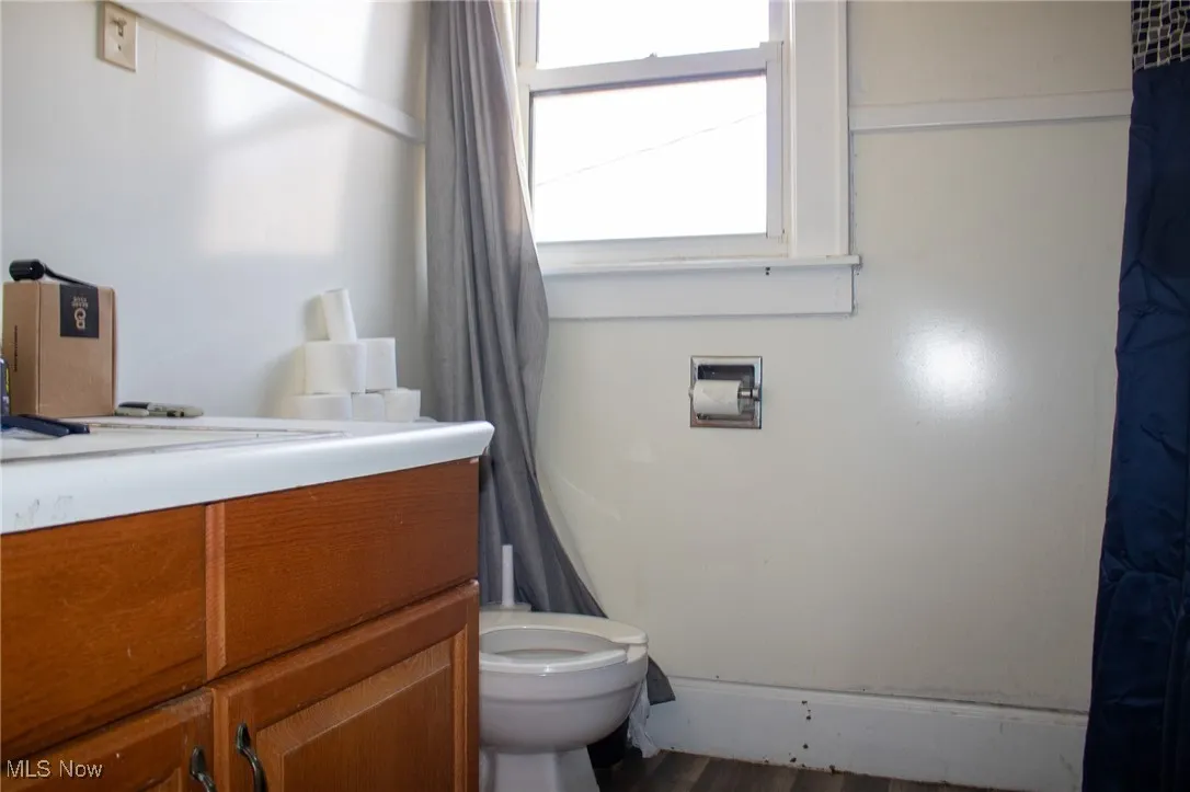 Bathroom featuring toilet and vanity