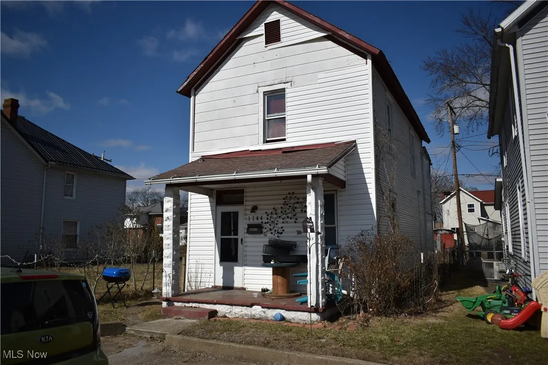 View of front of property featuring covered porch