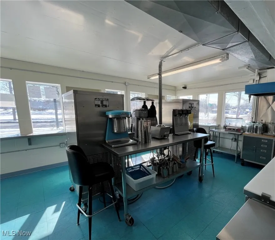 Kitchen featuring tile patterned floors