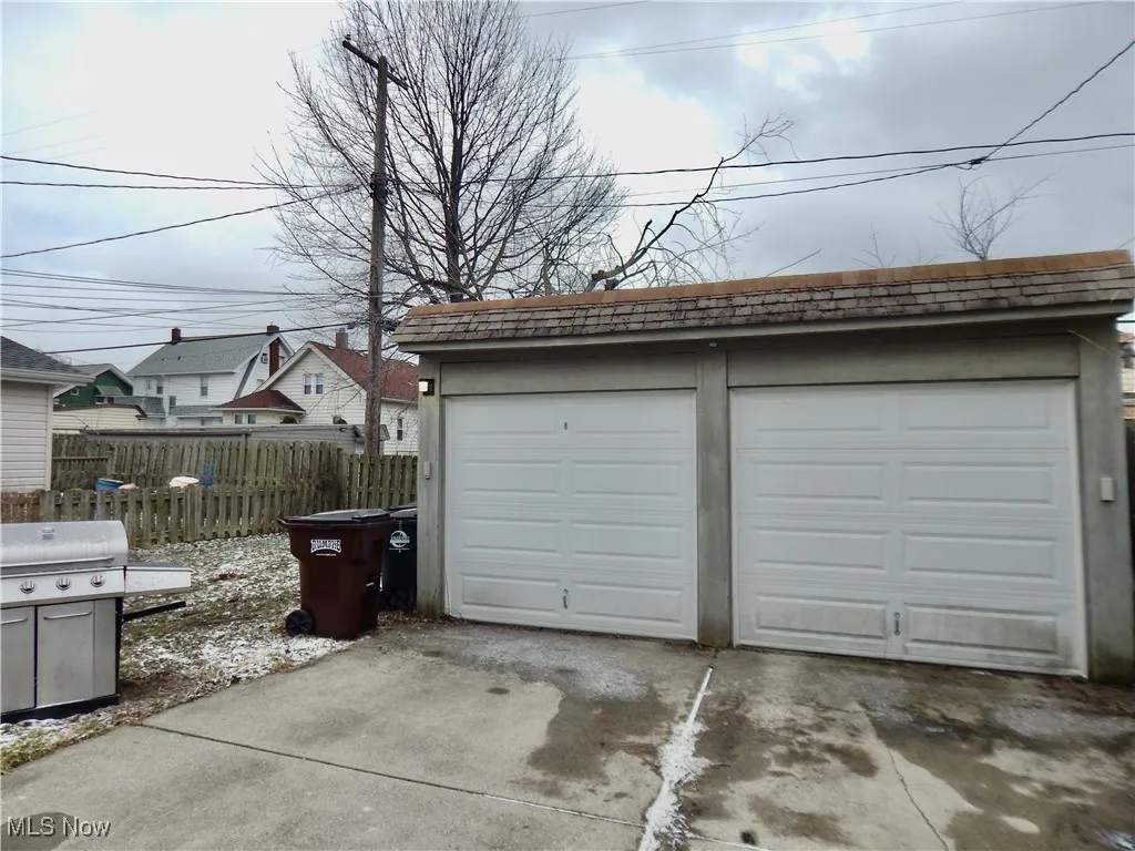 Detached garage with fence