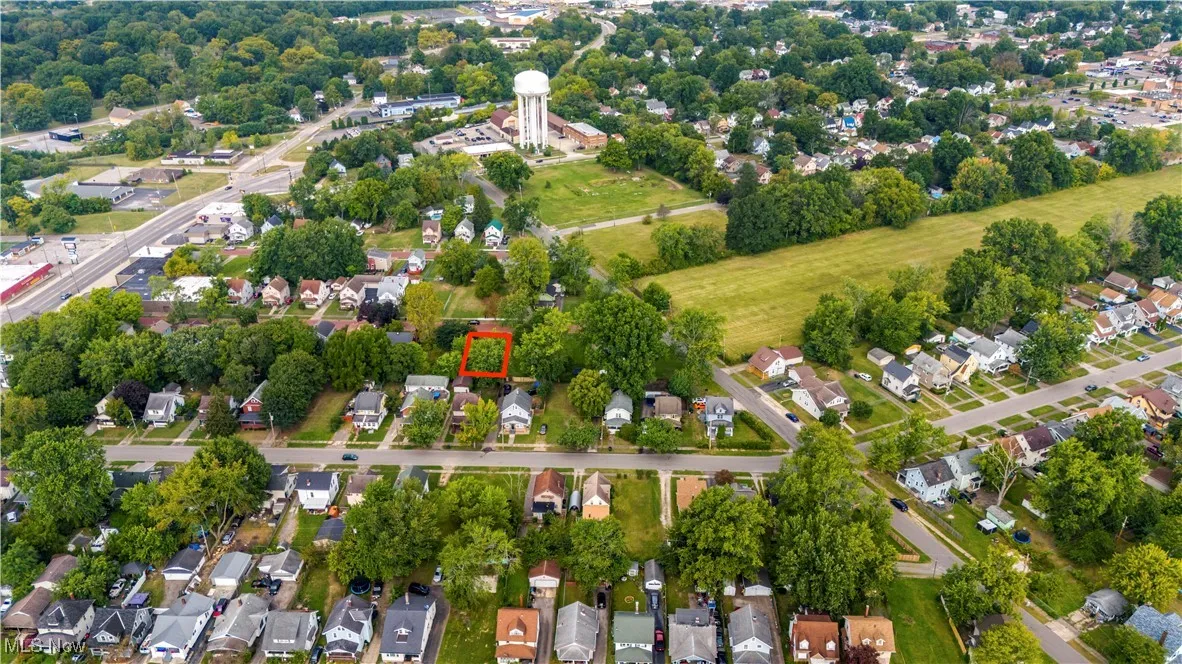 Birds eye view of property with a residential view