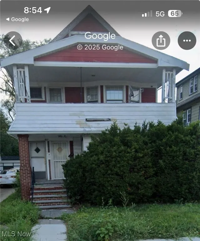 View of front of home with brick siding