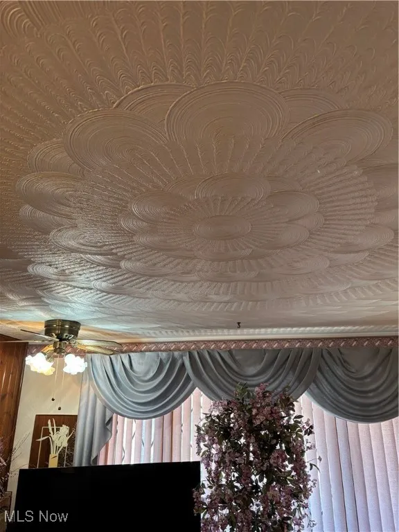 Room details with wallpapered walls