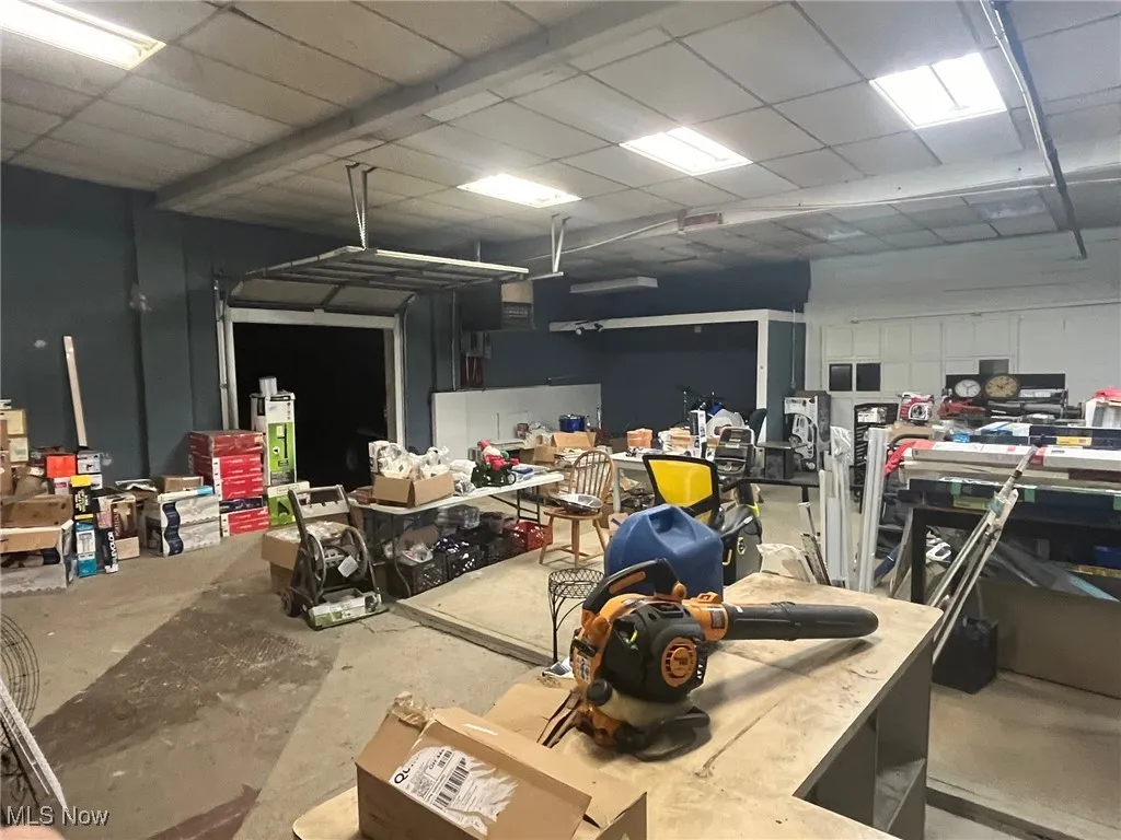 Garage featuring a workshop area