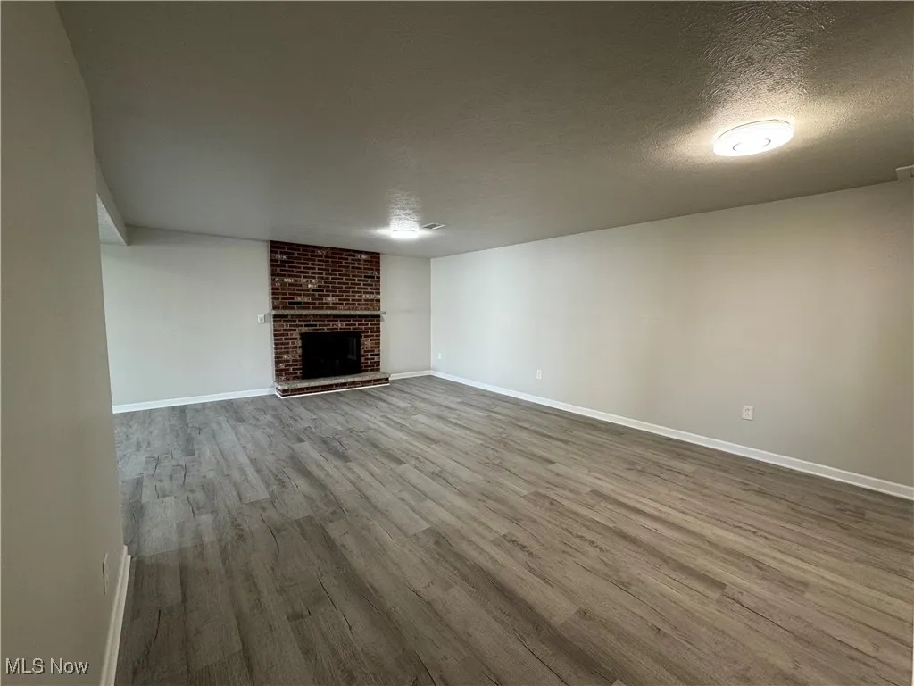 With Wood burning fireplace and more
