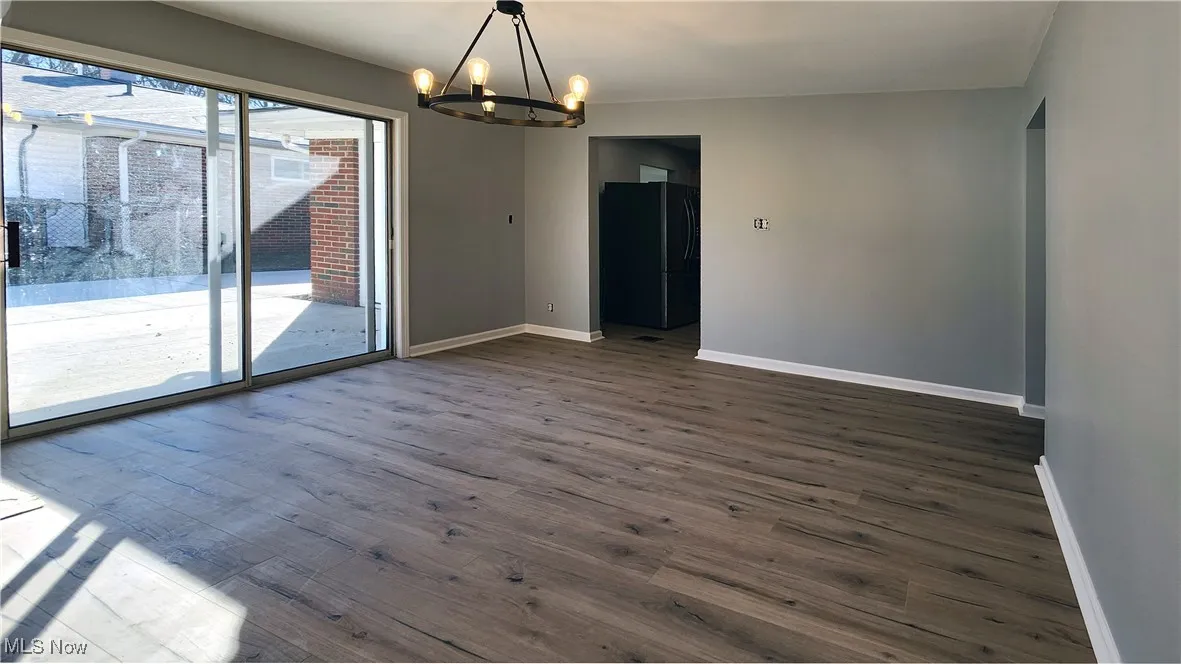 Family room opens to concrete patio