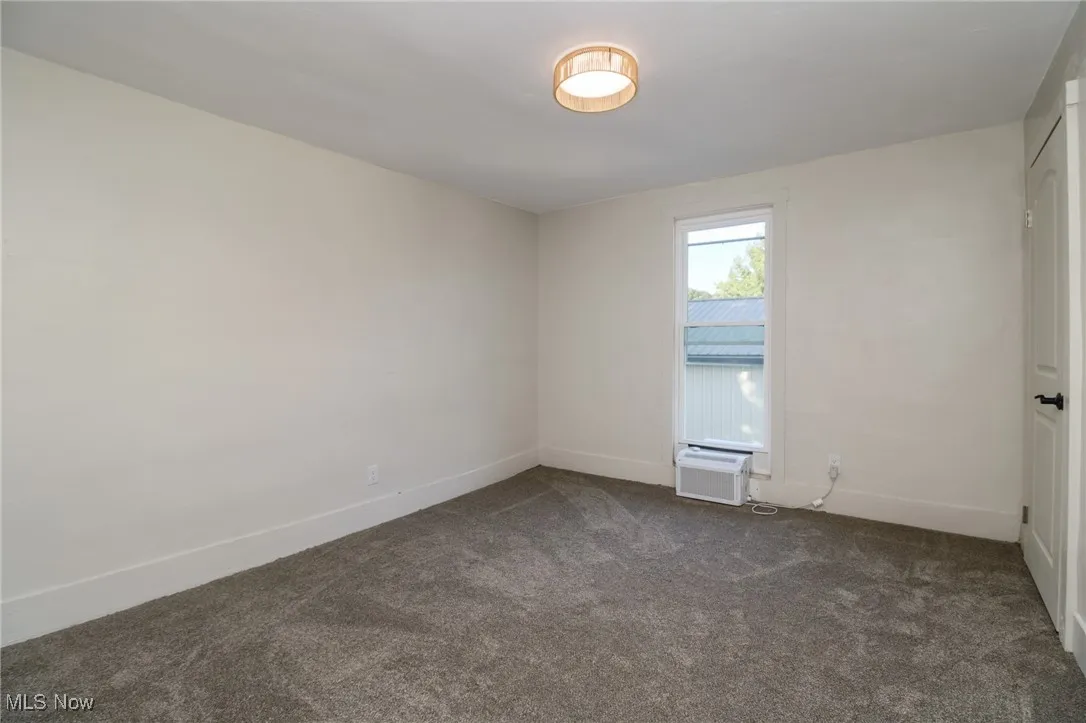 Bedroom with new carpet and neutral colors